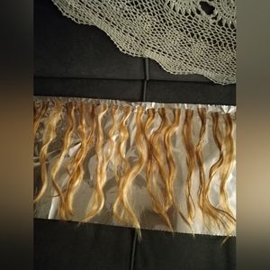 78 pieces of tape-in human hair.